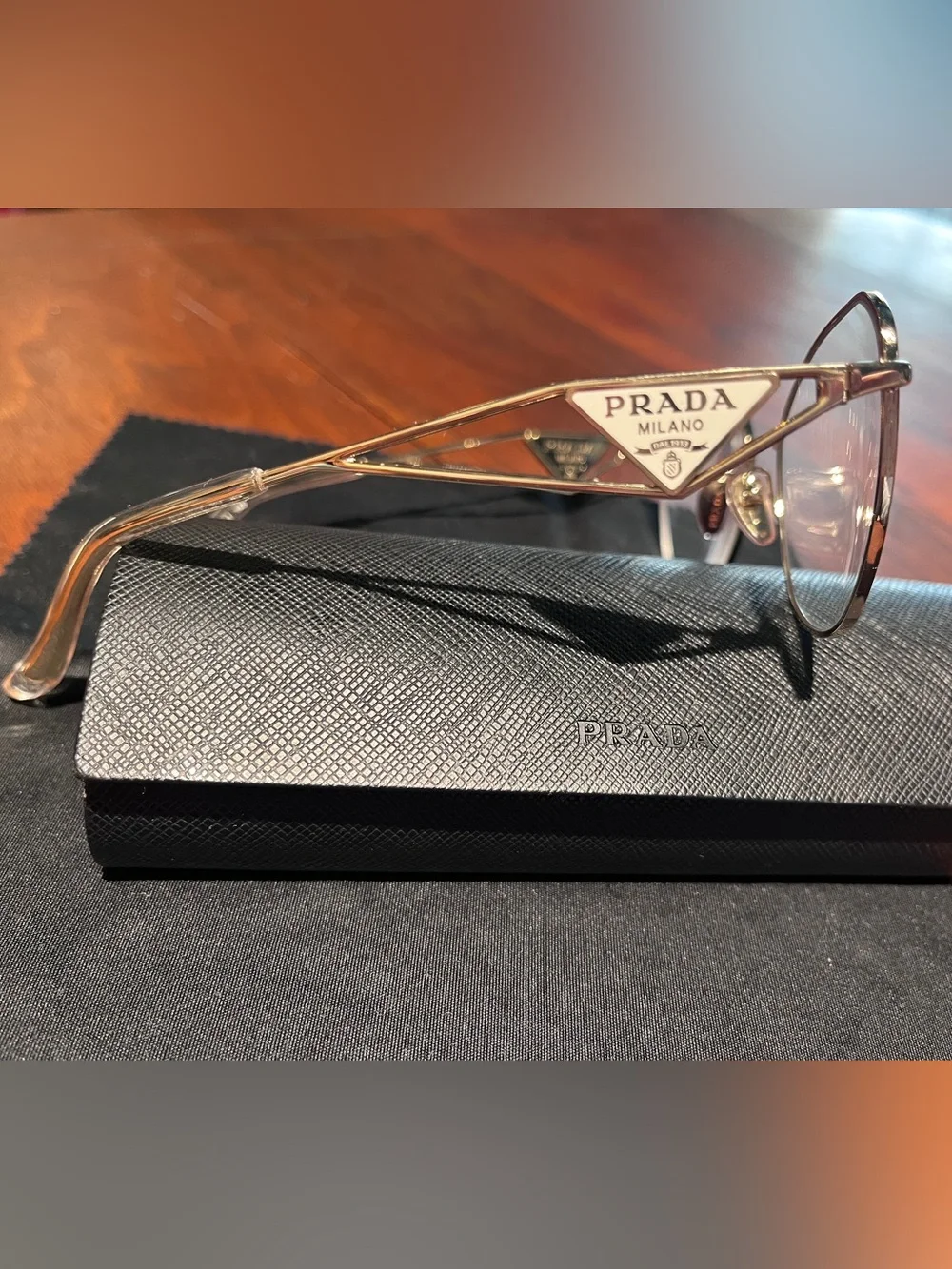 Prada - eyeglass frames - PR 52ZV - pale gold